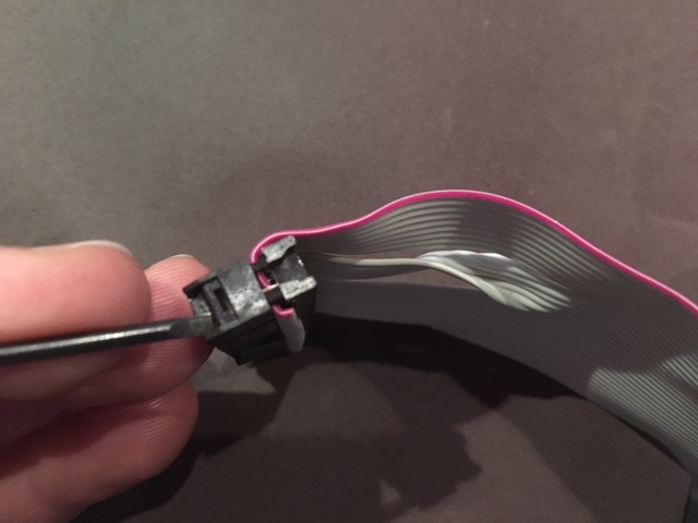 Open up the plug (very carefully)